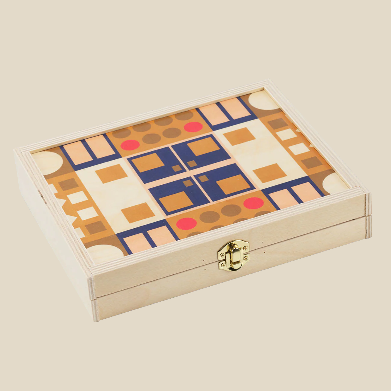 “Alexander Olive” travel backgammon set on beige background. Pattern depicts a geometric mid-century inspired pattern in orange and blue hues. Brass closure.